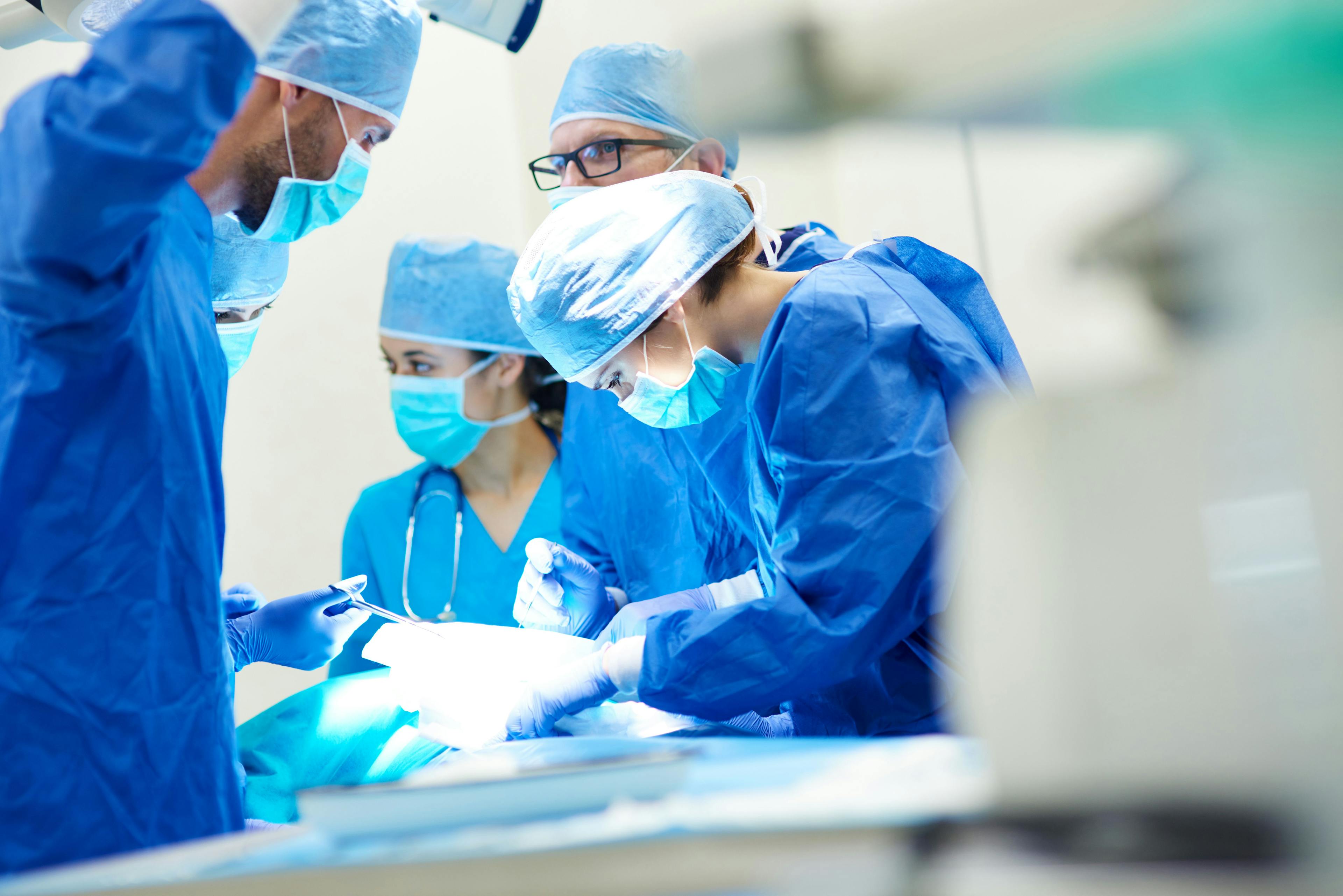 Doctors performing surgery | Image credit: gpointstudio - stock.adobe.com