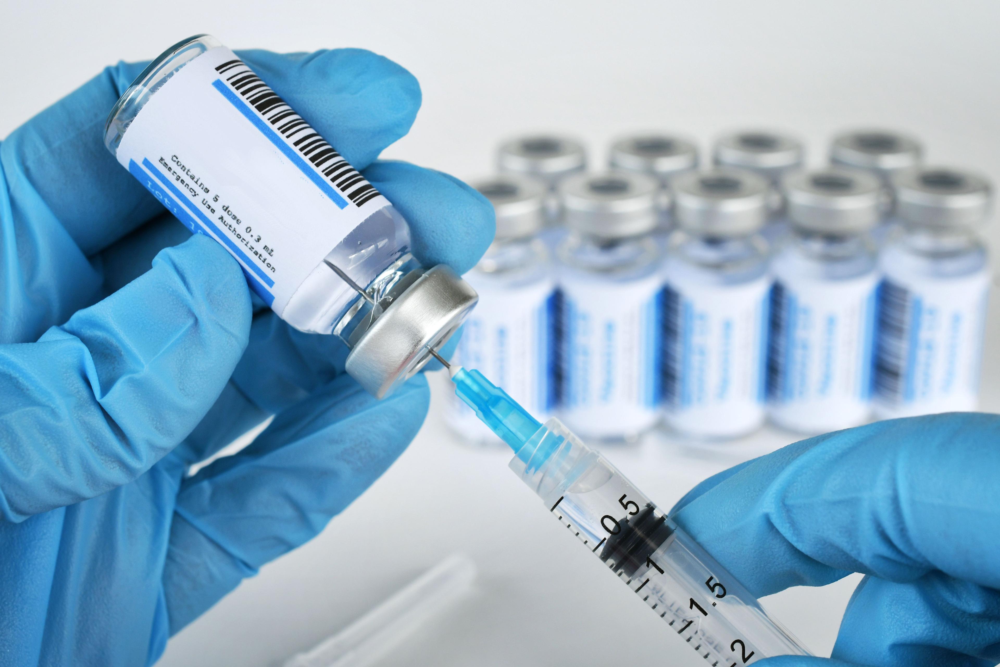 Medical personnel filing a syringe needle | Image Credit: MargJohnsonVA - stock.adobe.com