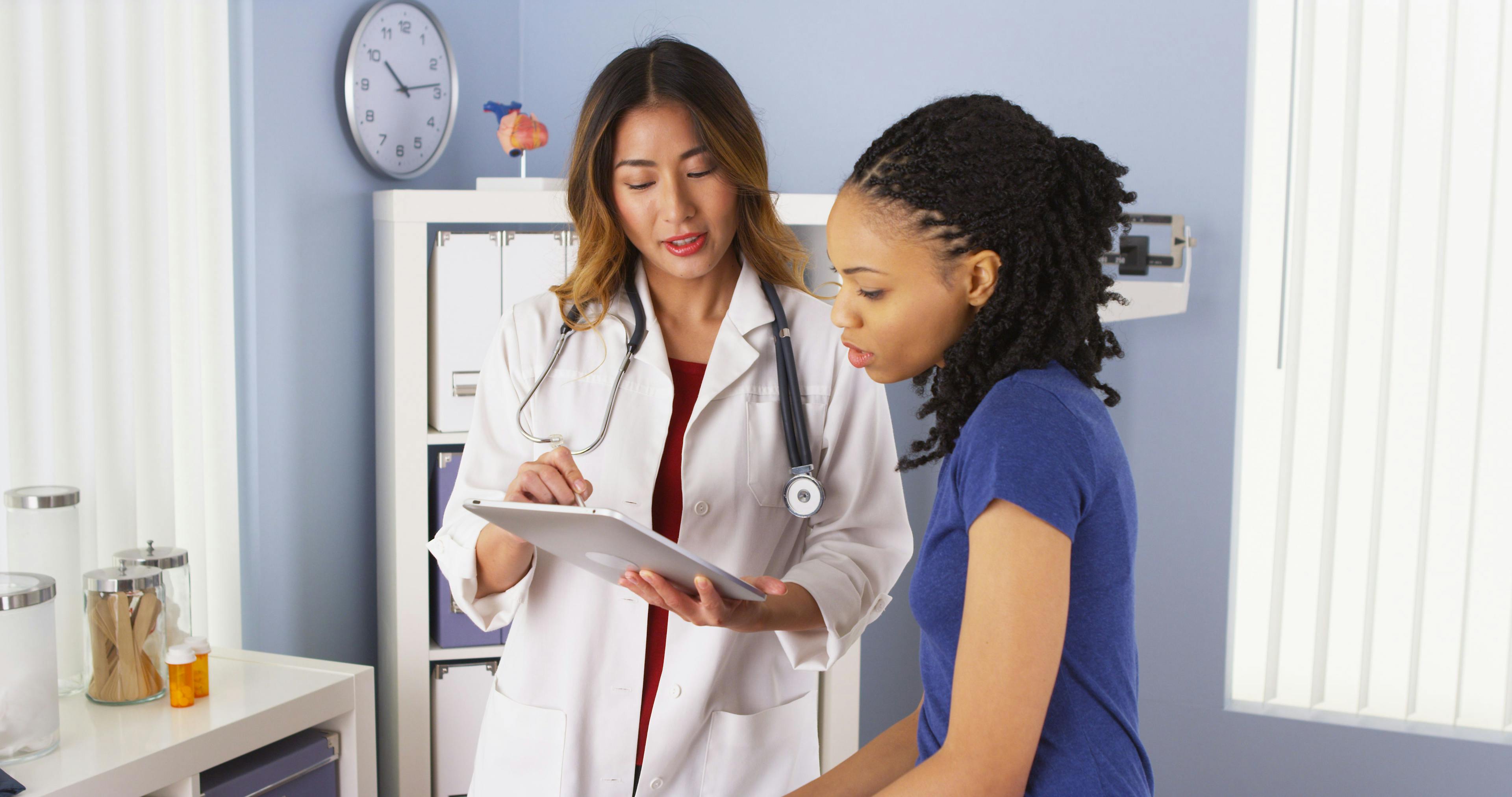 Female patient and physician speaking | Image Credit: rocketclips - stock.adobe.com