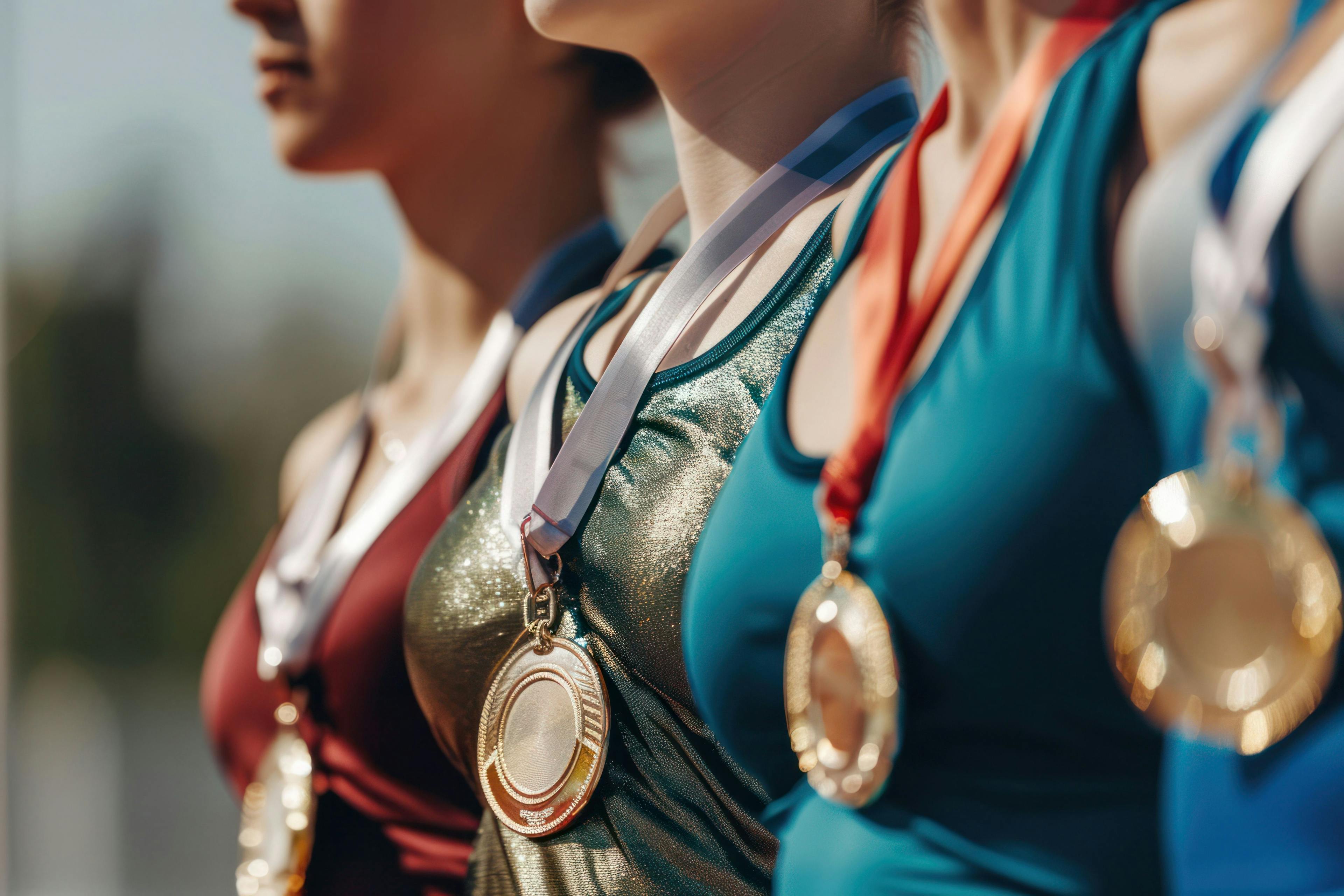 Female athletes winning medals | Image Credit: venusvi - stock.adobe.com 