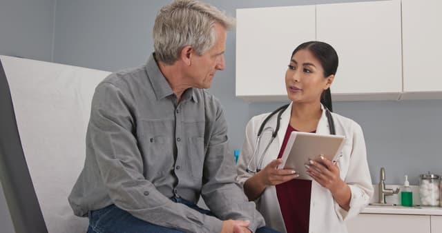 Doctor talking to older adult | Image credit: rocketclips - stock.adobe.com