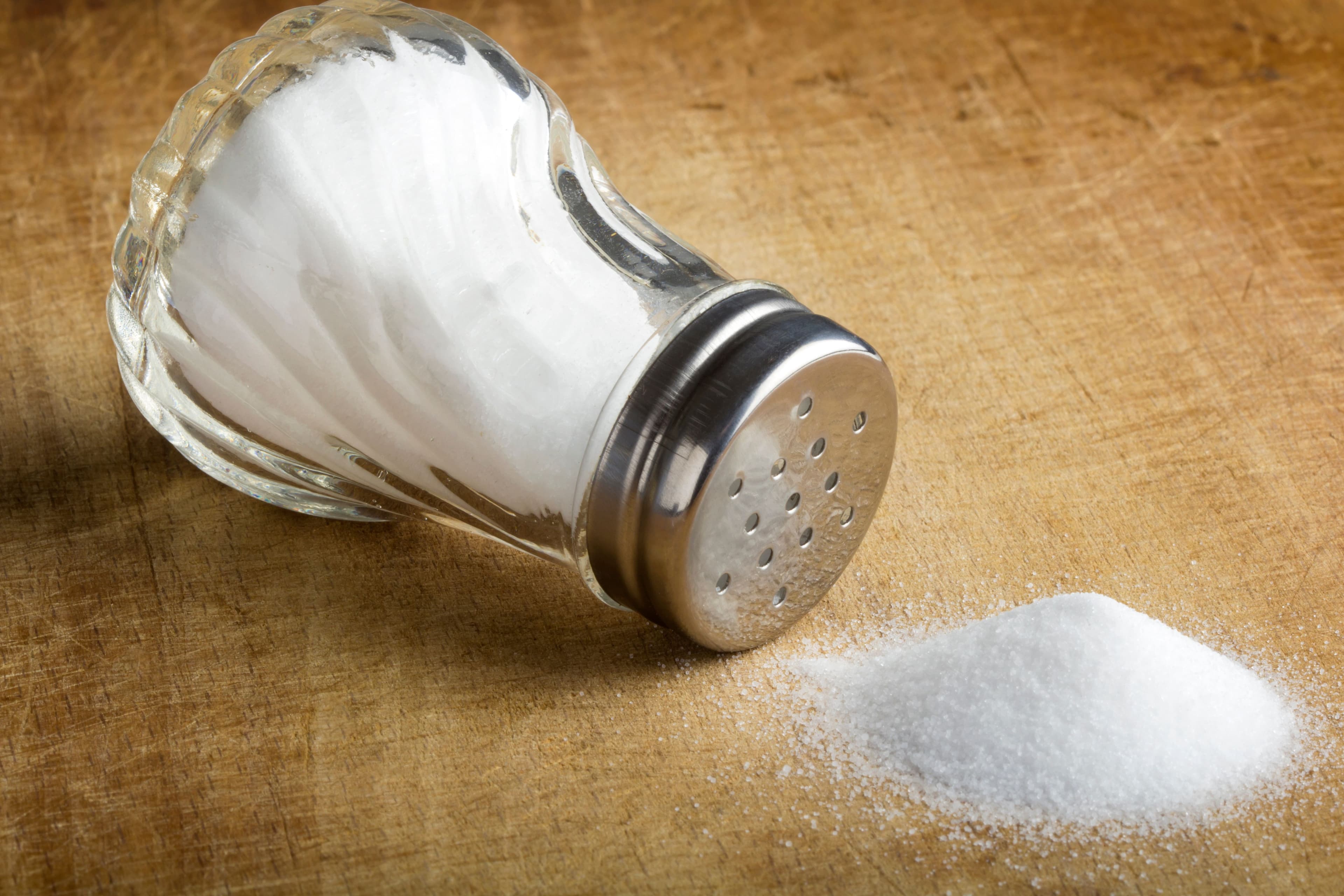 Salt shaker spilled on table | Image Credit: Sebastian Studio - stock.adobe.com