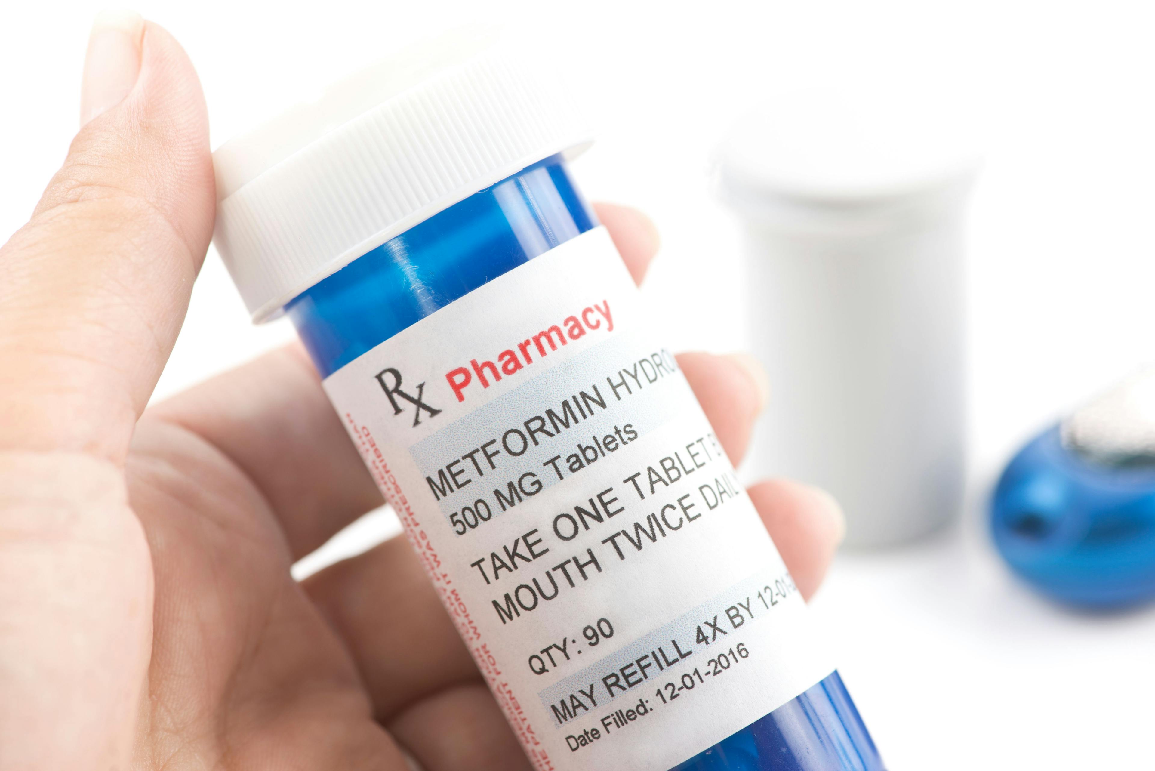 Patient holding metformin prescription | Image Credit: Sherry Young - stock.adobe.com