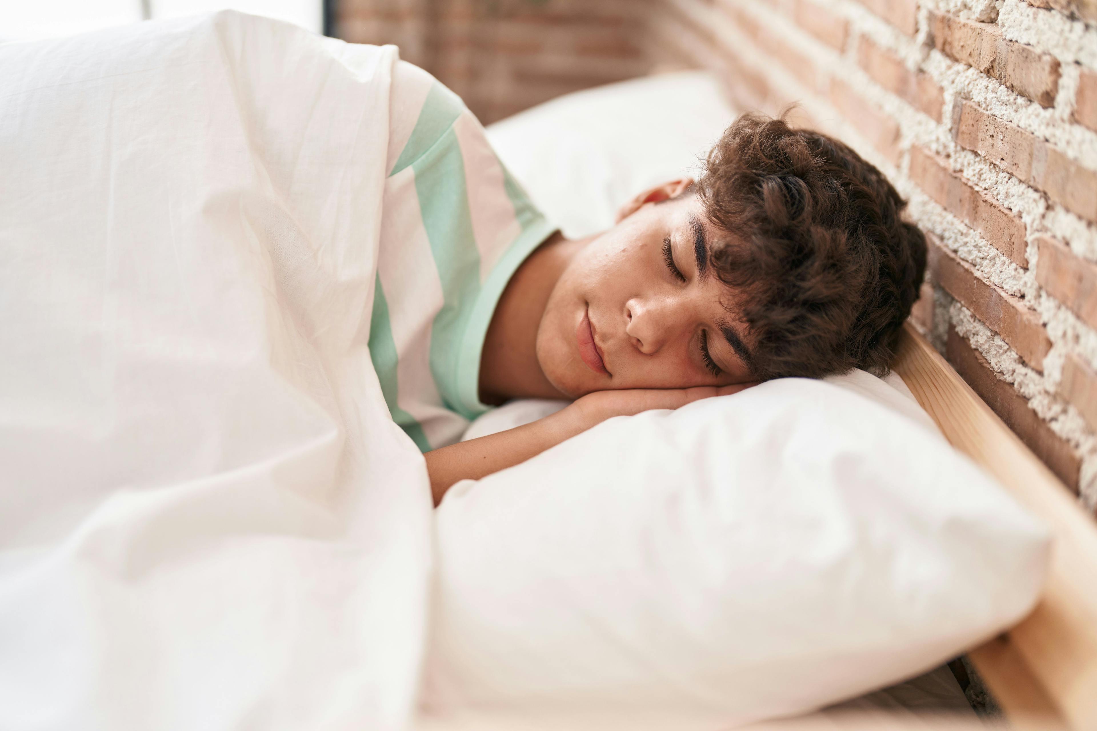 Teenager sleeping | Image credit: Krakenimages.com - stock.adobe.com