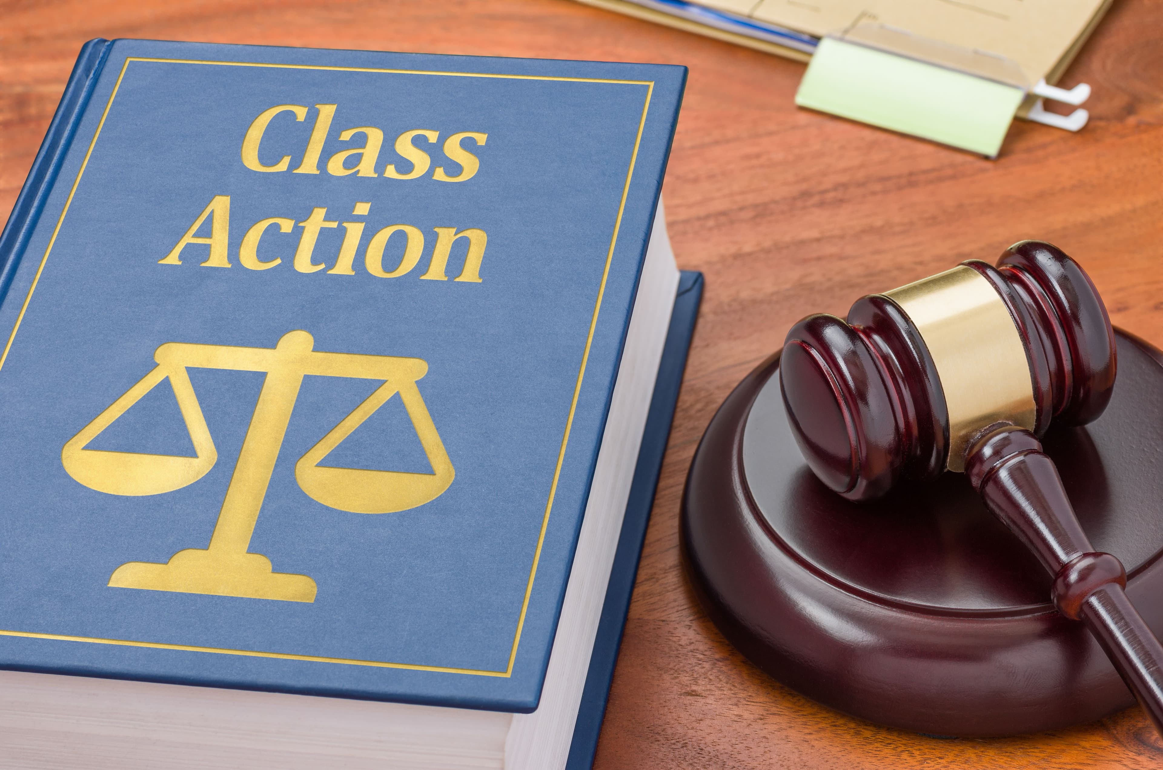 Class action book and gavel | Image credit: Zerbor – stock.adobe.com