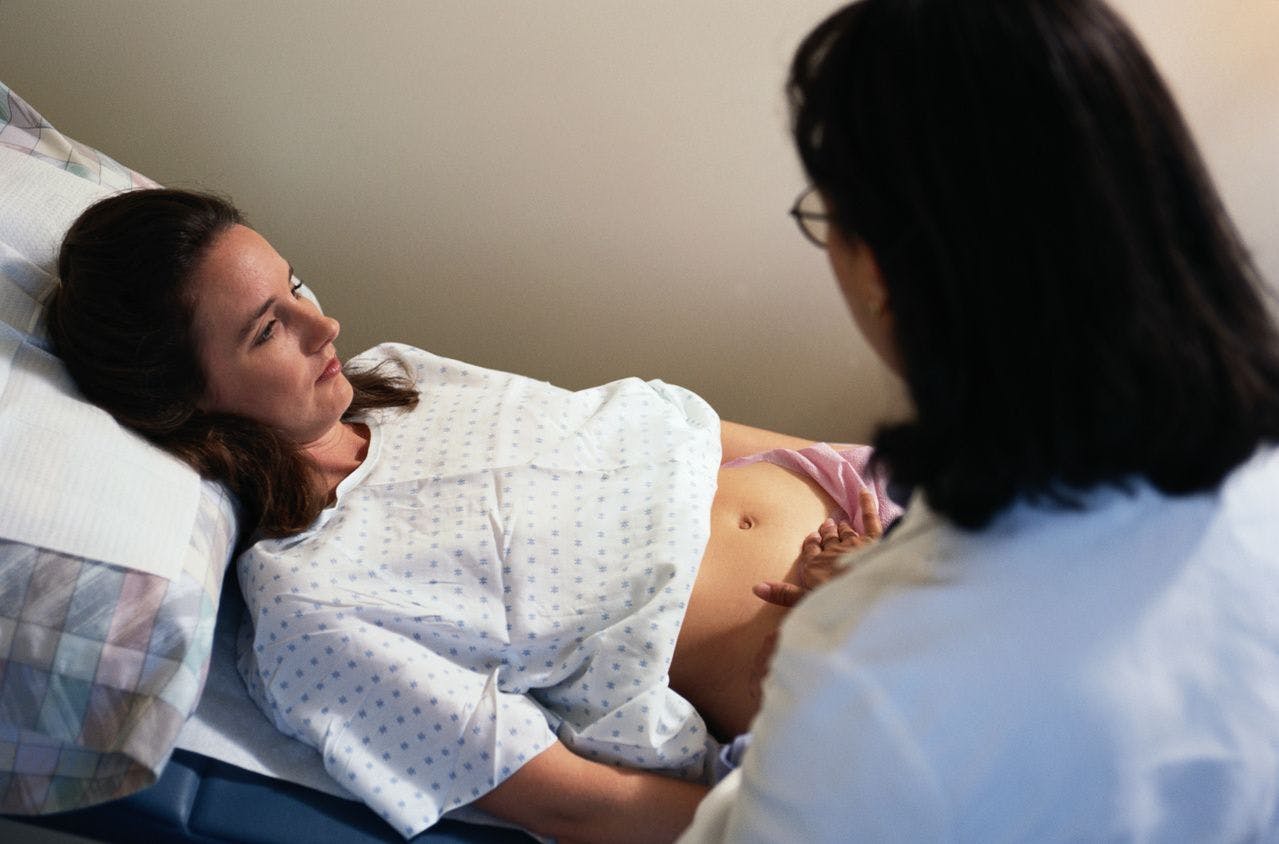 Image of a doctor and a pregnant patient