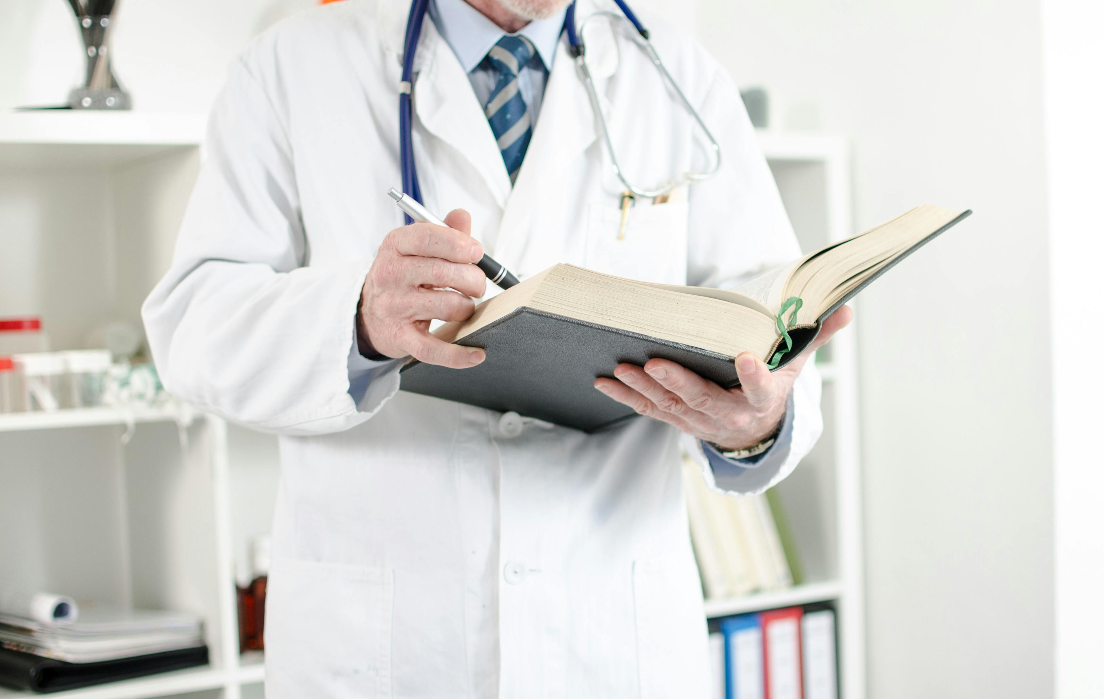Doctor with medical book