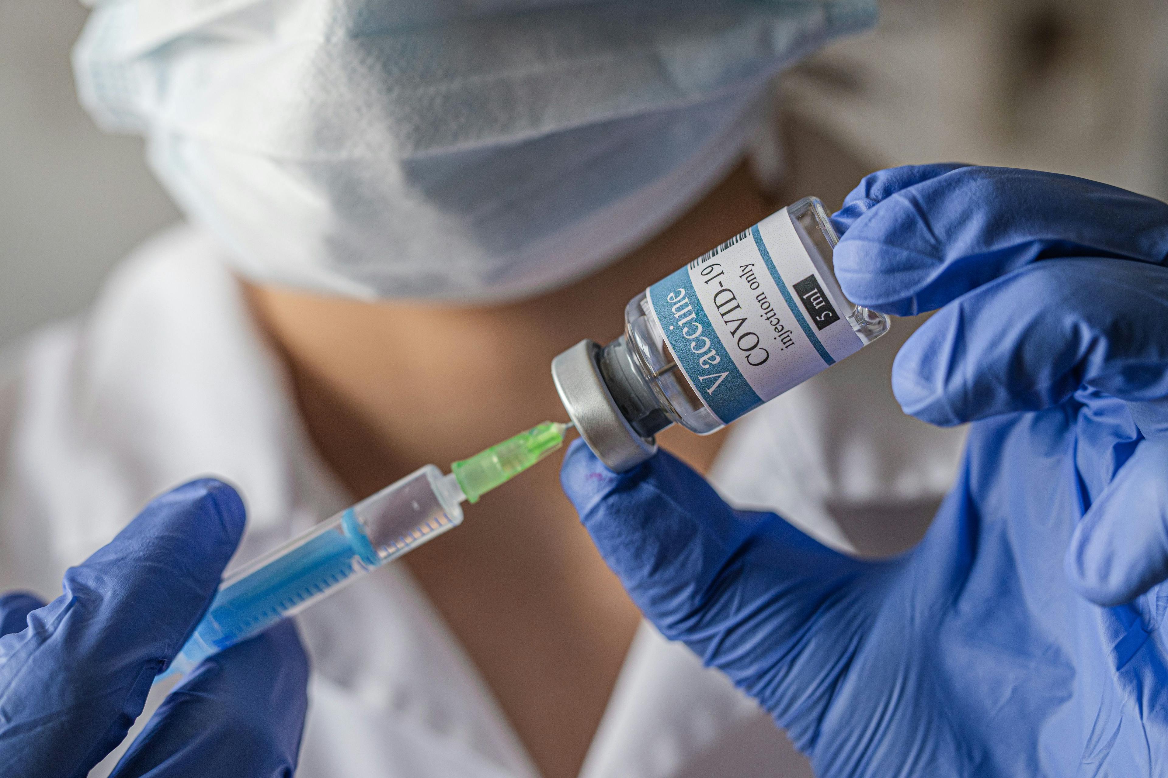 Clinician Preparing COVID-19 Vaccine | image credit: myskin - stock.adobe.com