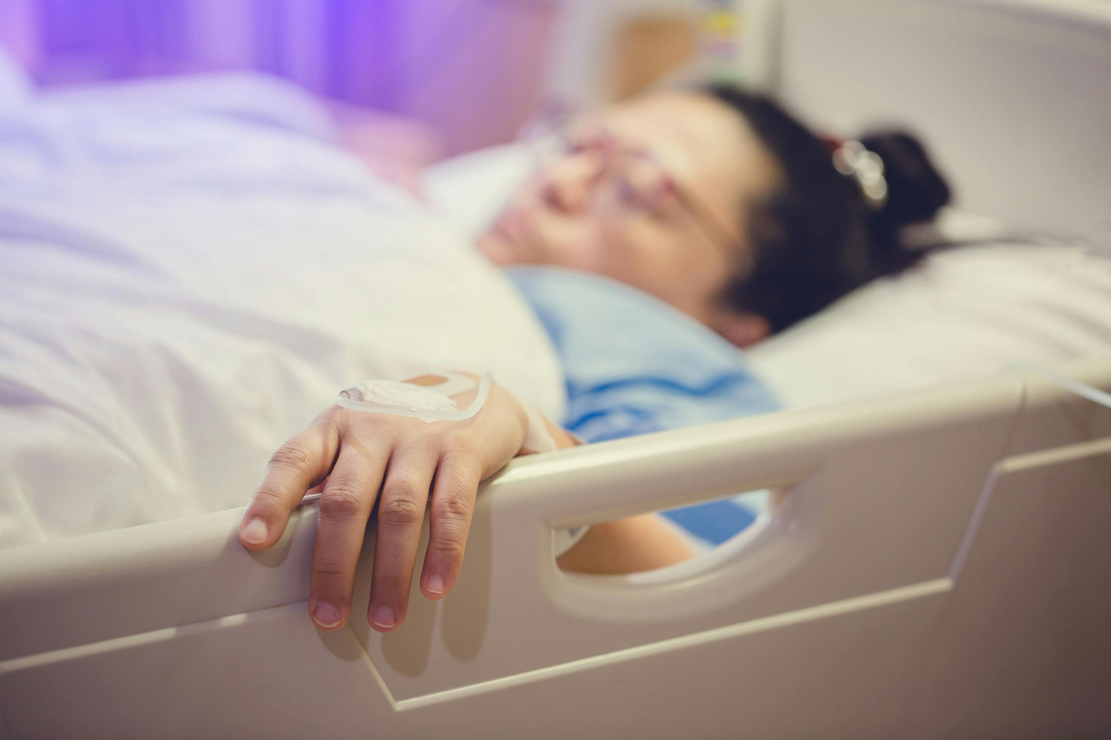 Patient in hospital bed | Image credit: Koonsiri - stock.adobe.com