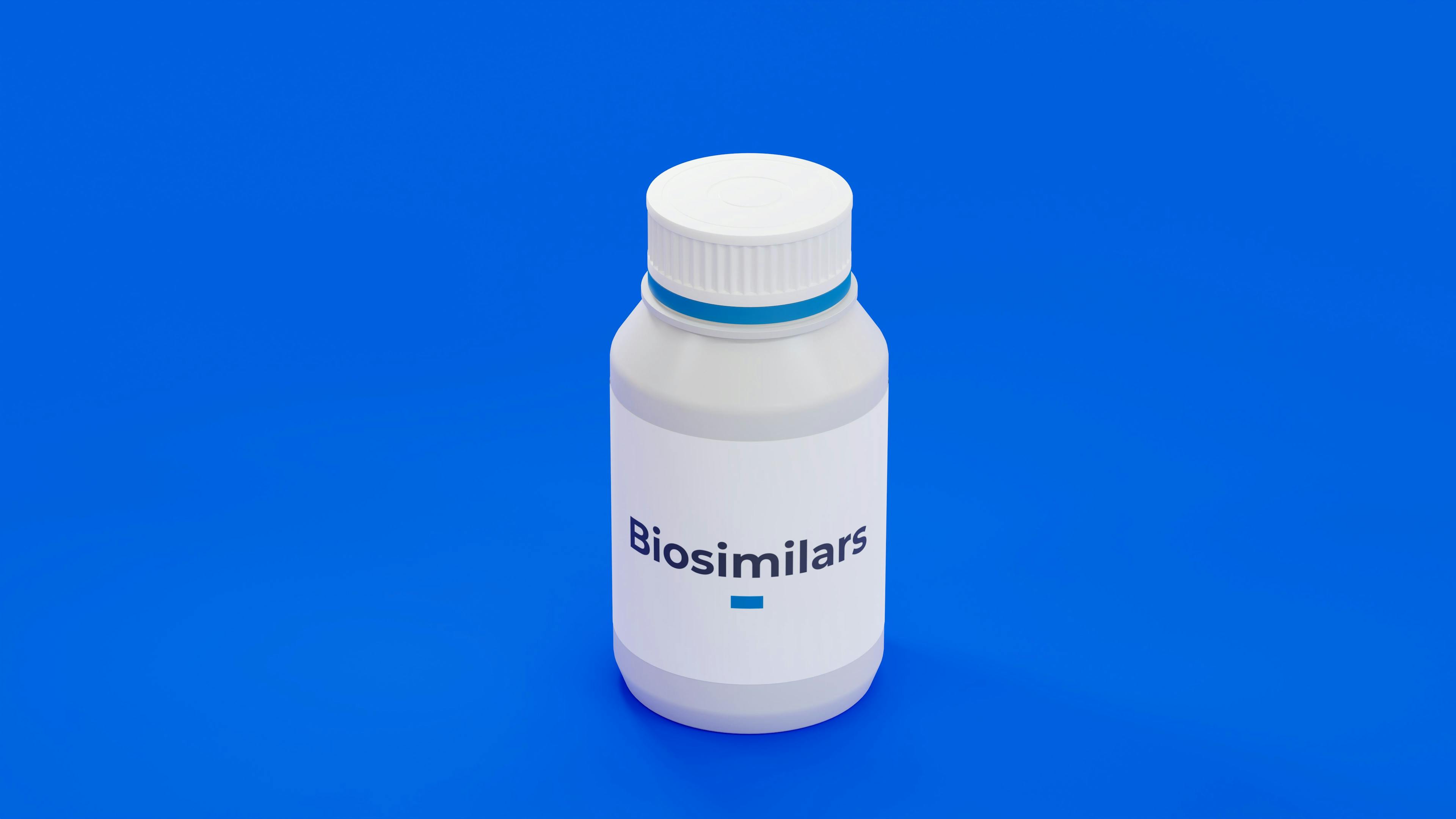 Biosimilar Drug Bottle on Blue Background | image credit: Carl - stock.adobe.com