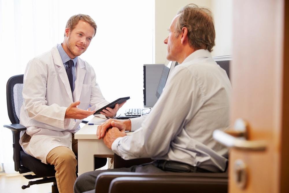 Image of a doctor and patient talking