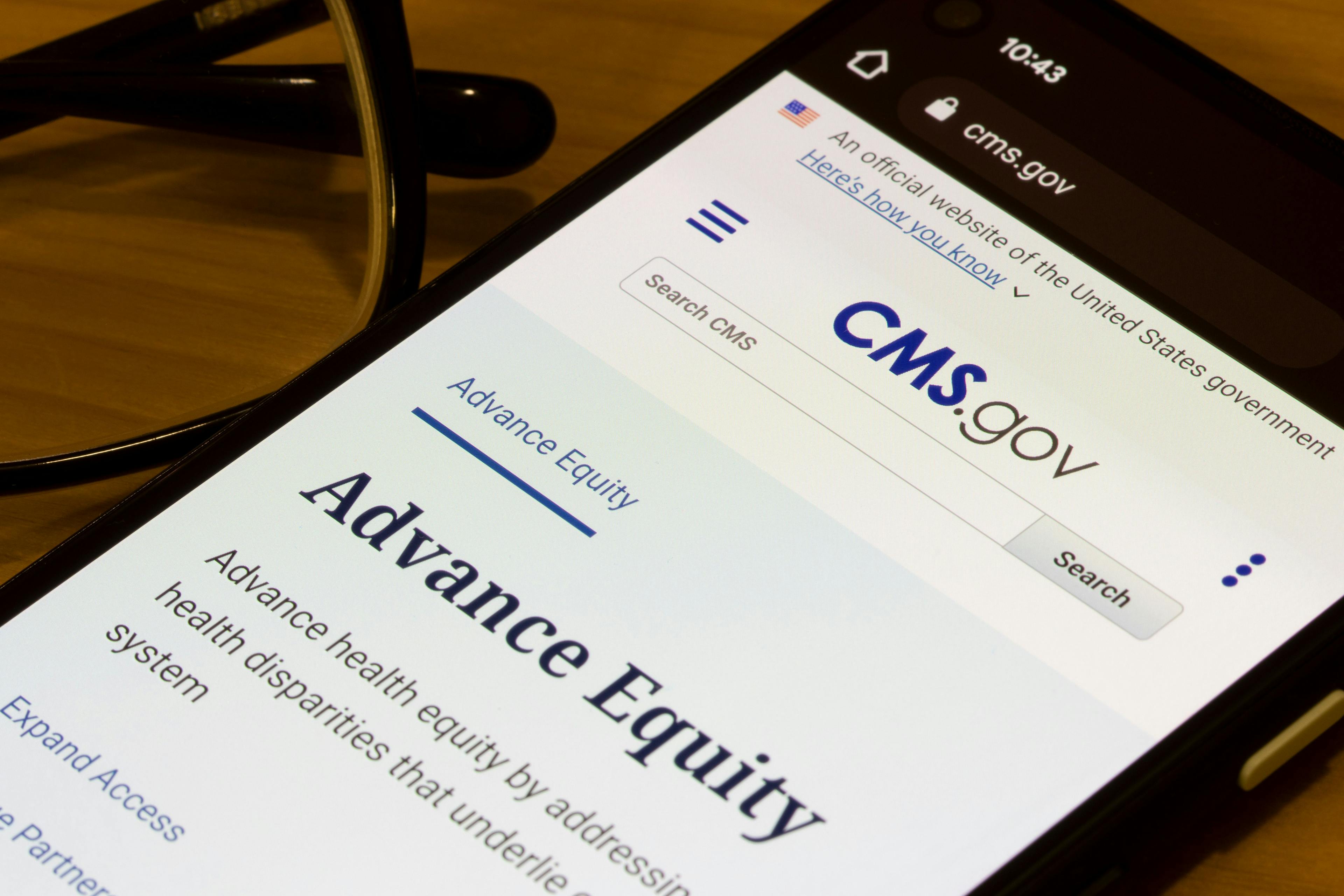 The homepage of CMS.gov is seen on a smartphone | Image Credit: © Tada Images - stock.adobe.com